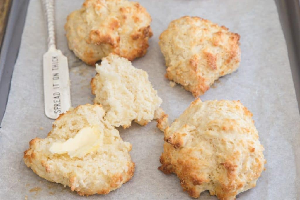 Biscuits with 1 cut and butter.