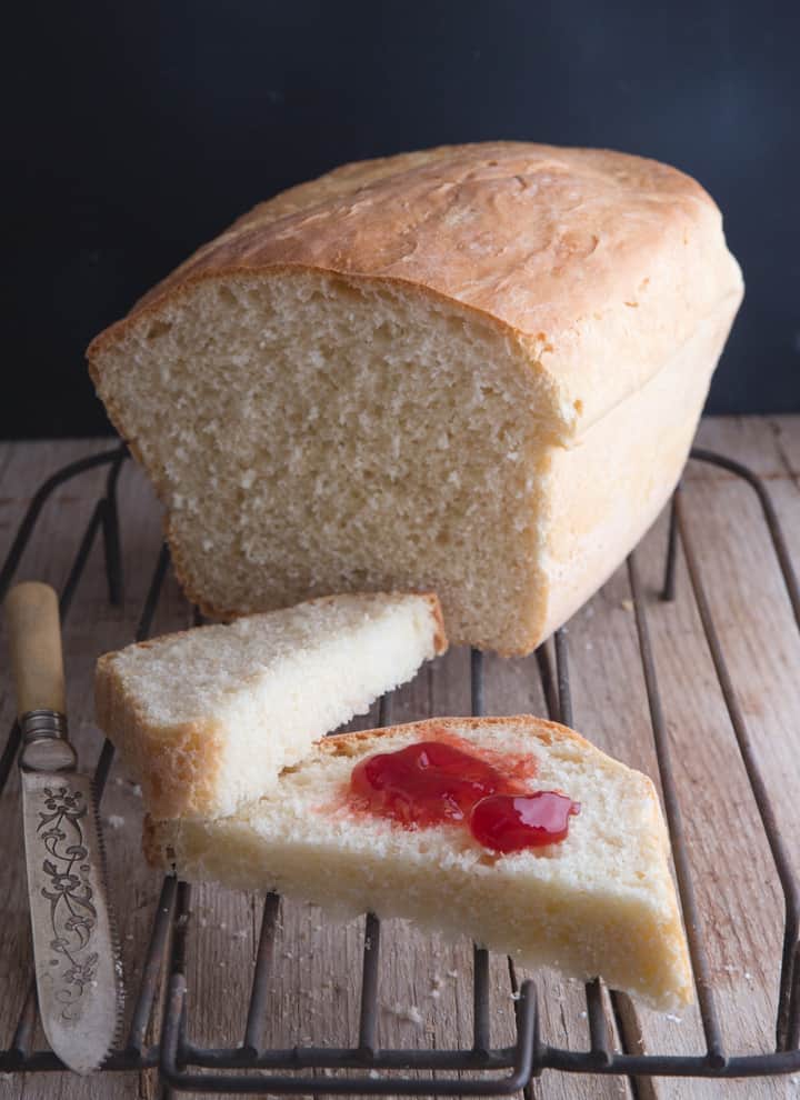 loaf with a slice cut in half with jam