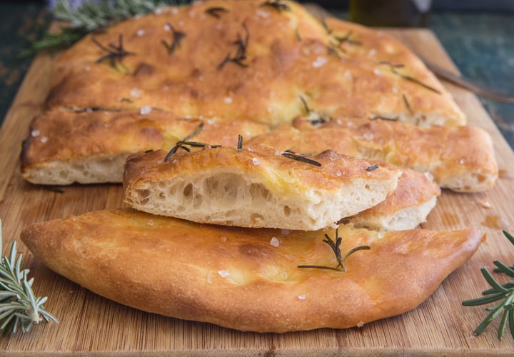 a slice of focaccia on top of the finished bread