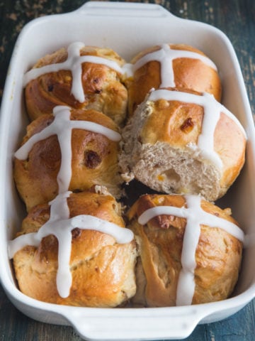 hot cross buns in a white pan