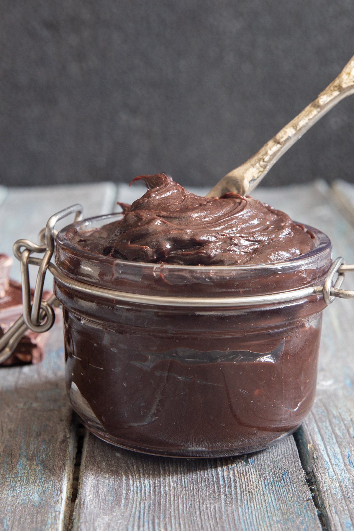 Chocolate Spread in a jar with a silver knife.