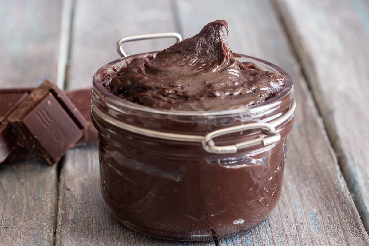 Chocolate spread in a glass jar.
