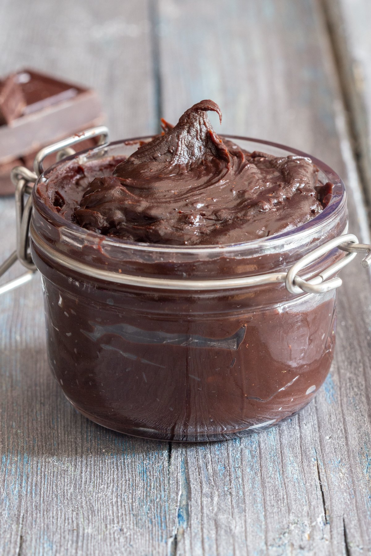 Chocolate cream spread in a glass jar.