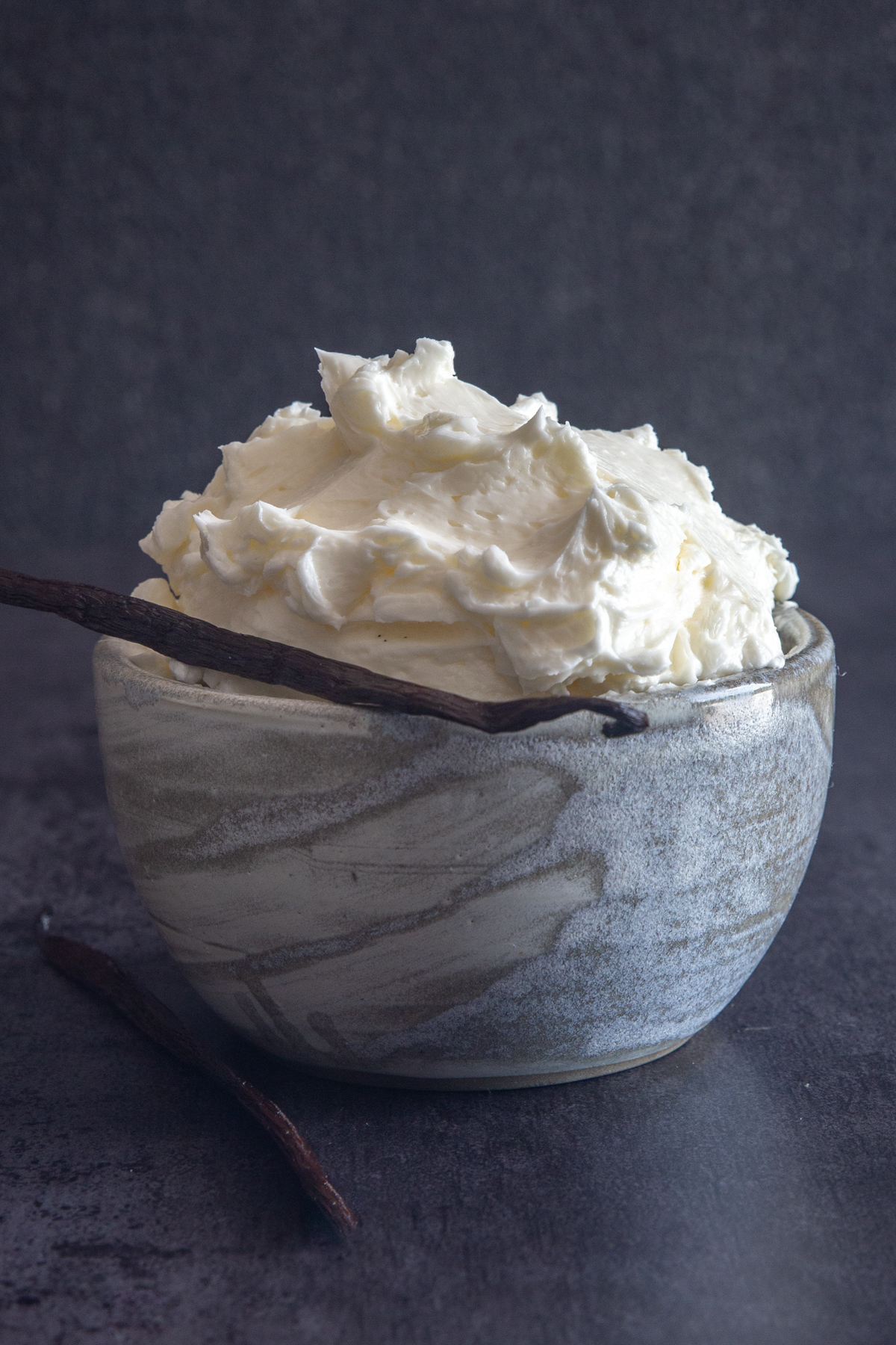 Swiss meringue buttercream in a blue bowl.