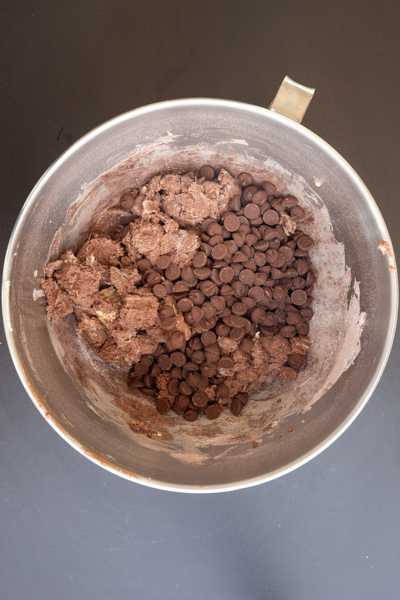 Chocolate chips added to mixing bowl.