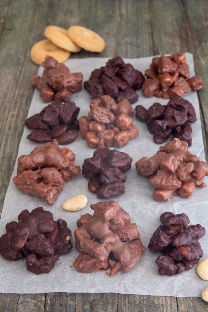 Chocolate clusters on parchment paper.