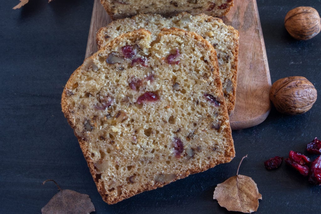 A slice of cranberry bread up close.