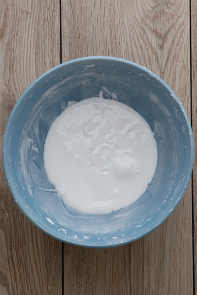 Royal Icing in a blue bowl.