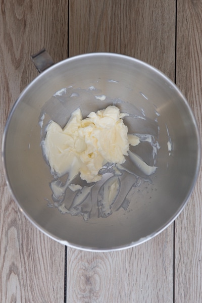 Creamed butter in mixing bowl.