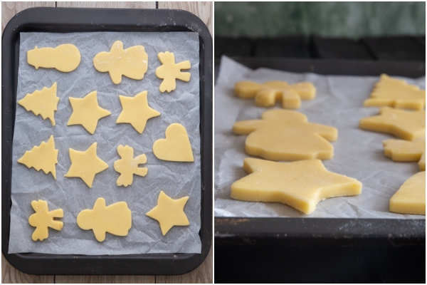 Cutout cookies on a cookies sheet.