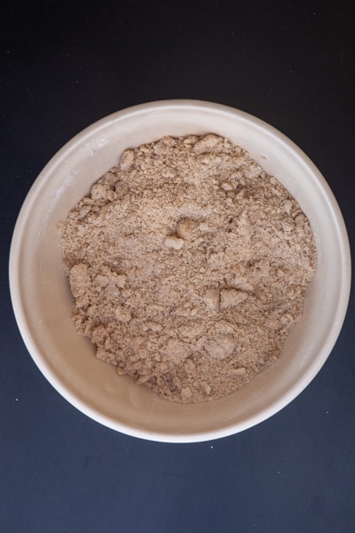 Crumb mixture in a white bowl.