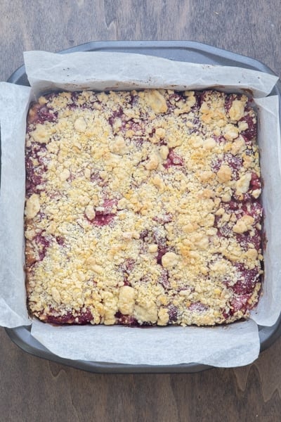 Baked cherry crumb bars in the pan.