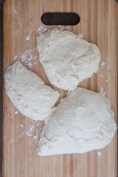 The dough divided into 3 parts.