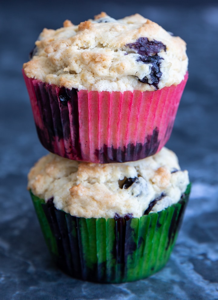 2 blueberry muffins stacked.