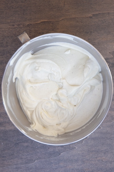Whipped cream and sweetened condensed milk mixture combined.