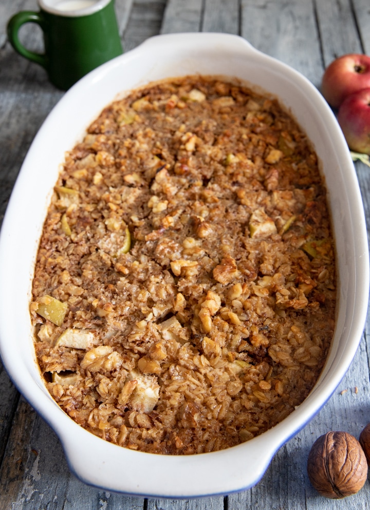 Baked oatmeal in a white baking dish.