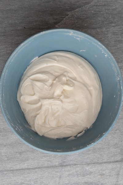 Frosting in a mixing bowl.