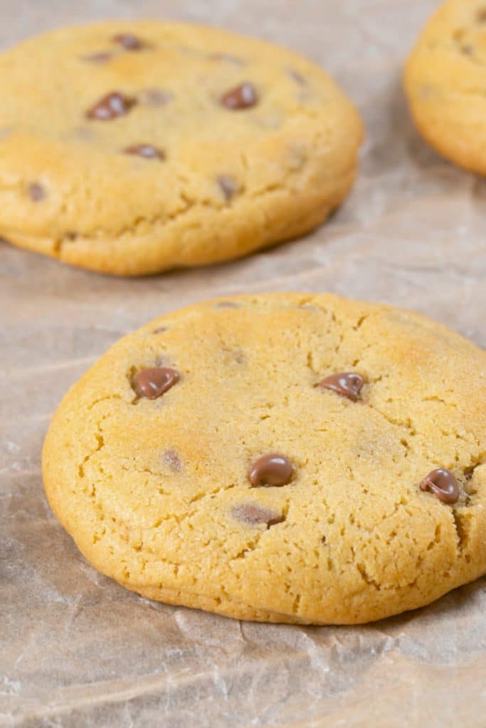 Stuffed cookies on parchment paper.