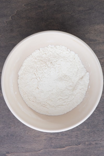 Dry ingredients inside a white bowl.