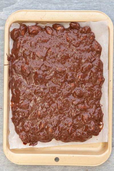 The chocolate bard on a baking sheet before firm.