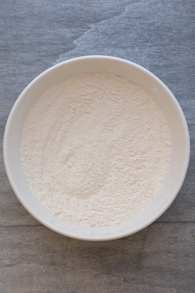 Whisked dry ingredients in a white bowl.