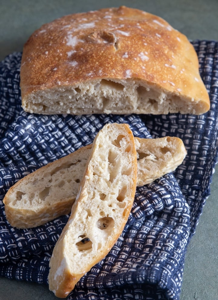 Ciabatta bread with 2 slices cut.