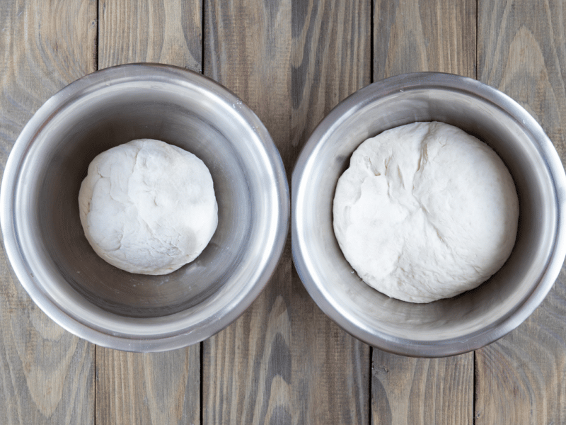 Pizza dough in a bowl doubled.