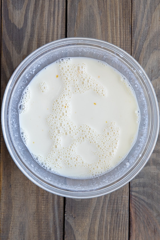 Buttermilk and egg mixed together in a bowl.