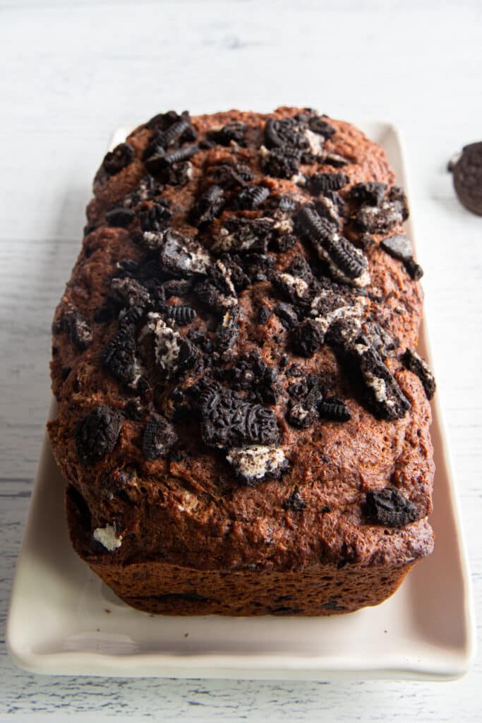 Oreo quick bread on a white plate.
