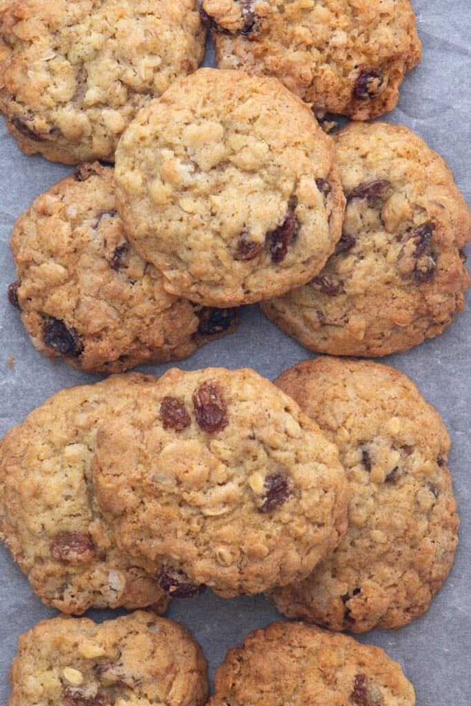 Oatmeal raisin cookies on top of each other.