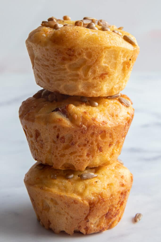 Three muffins stacked on top of each other.