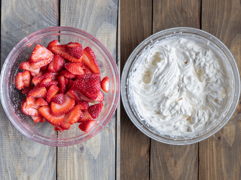 Strawberries mixed with sugar in a bowl and a bowl with whipped cream.