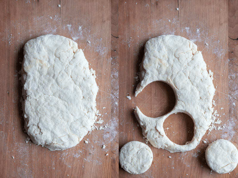 Biscuit dough patted into a rectangle and cut with round cookie cutter.