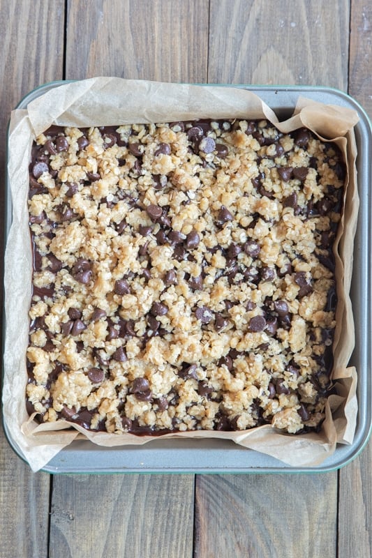 Oatmeal bars in a square baking pan.