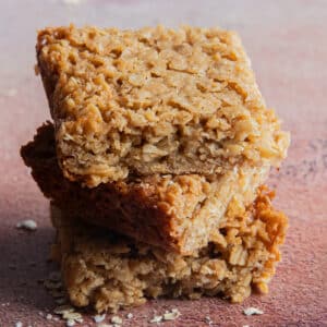 Three oat bar squares on top of the other.