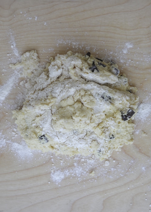 Soft scone dough on a floured flat surface.