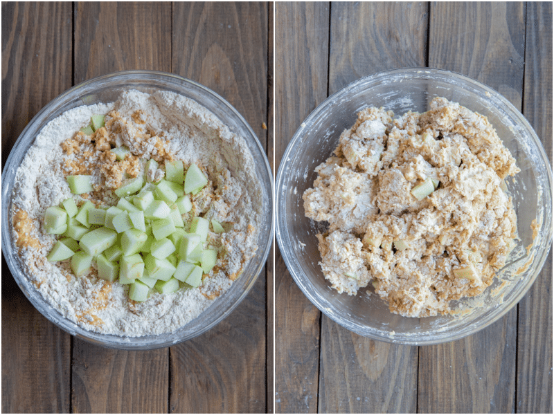 dry and wet mixture combined with apples in a bowl.