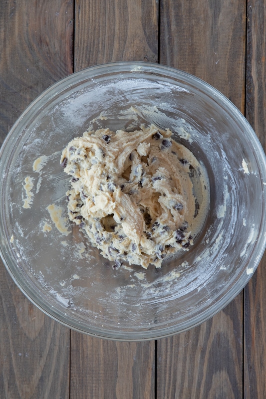 Cookie dough mix in a clear bowl.