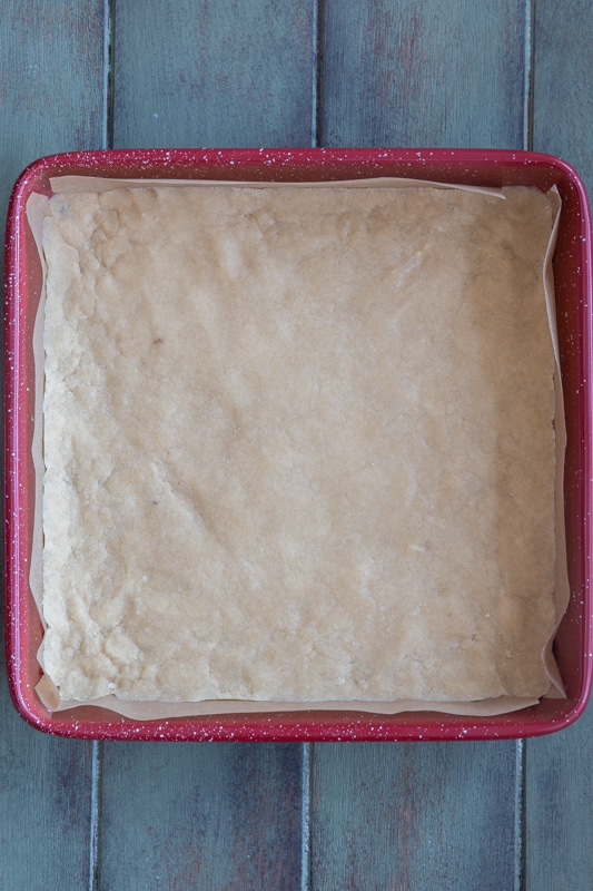 shortbread base in a square pan.