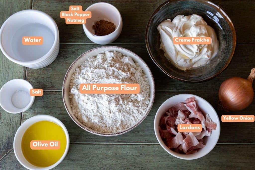 Flammkuchen ingredients in separate bowls.