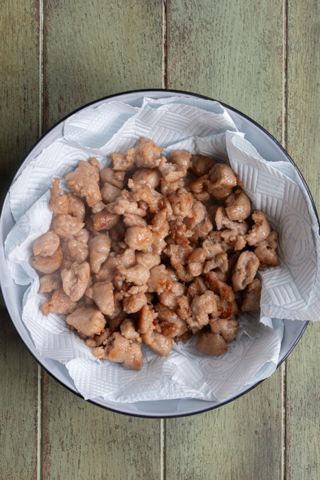Cooked sausage meat in a bowl.